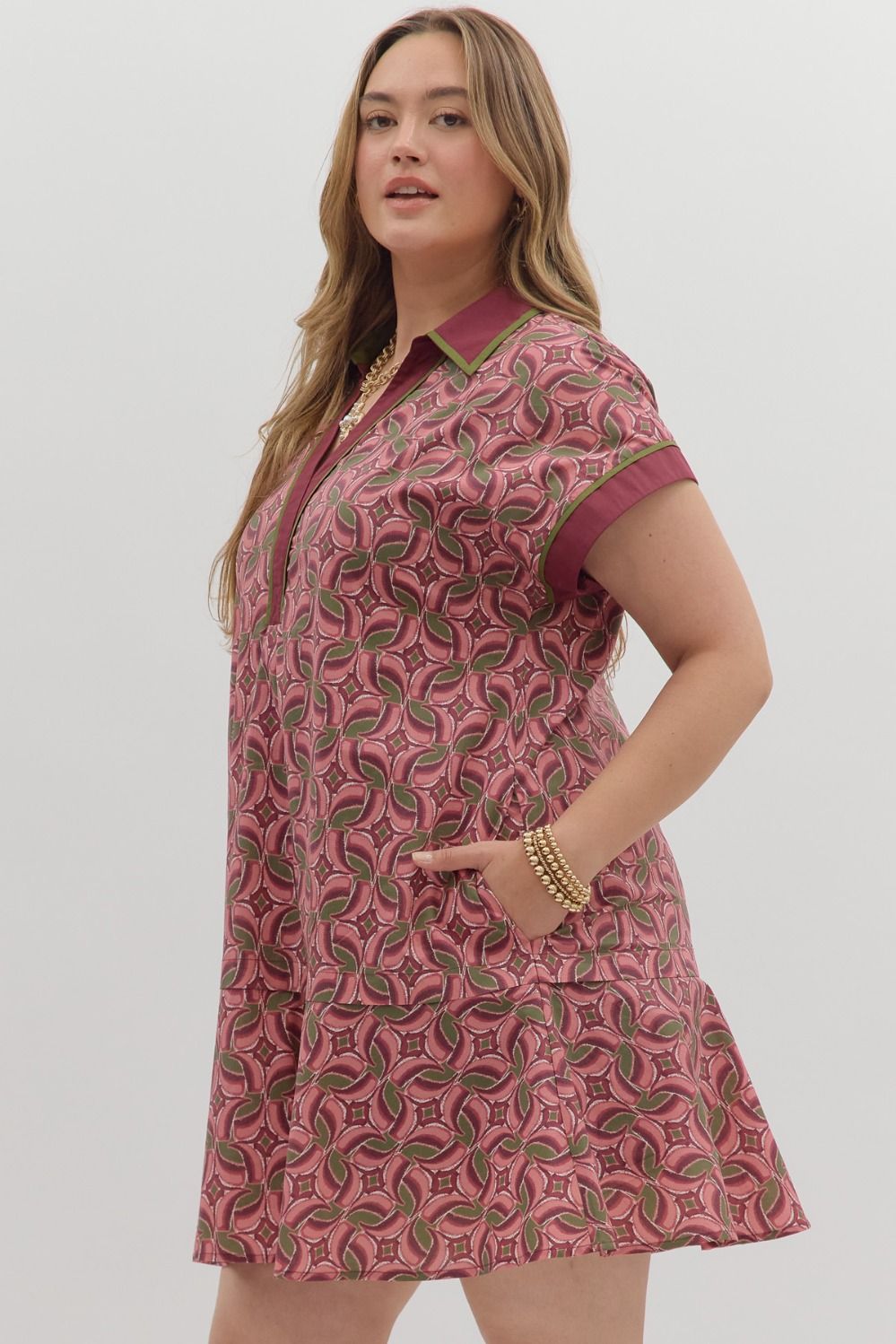 Women's burgundy, salmon and olive green abstract print dress in plus by Entro showing side view