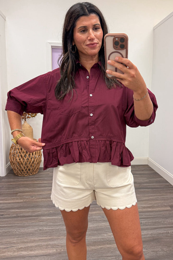solid burgundy button front peplum style ruffle hem boxy silhouette semi-cropped top