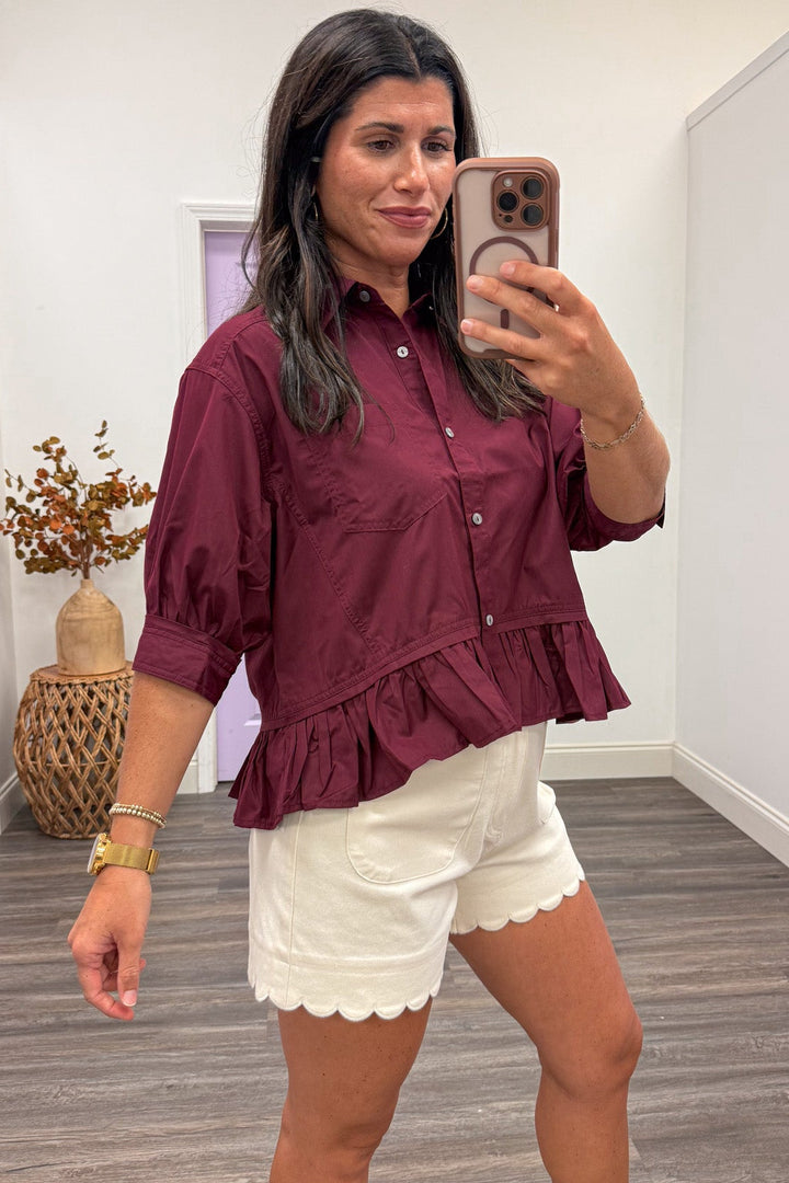 solid burgundy button front peplum style ruffle hem puff sleeve semi-cropped top