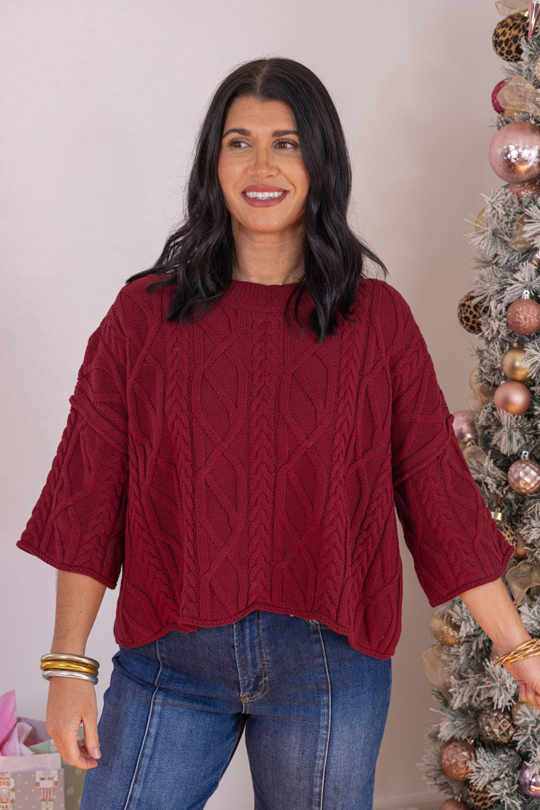 Women's burgundy cable knit cropped sweater by Entro