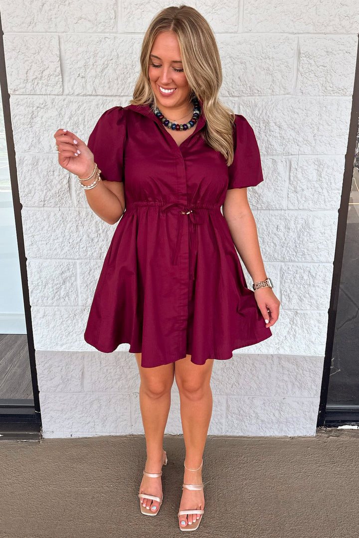solid burgundy button front short puff sleeve cinch waist cotton poplin short dress