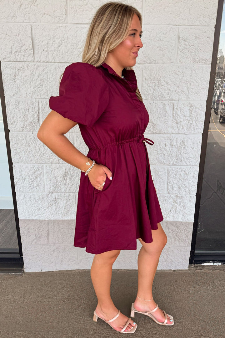 solid burgundy button front puff sleeve cinch waist cotton poplin short dress with side pockets