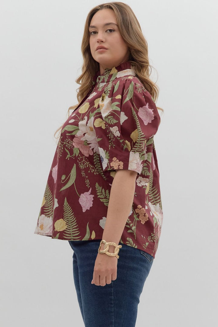 Women's burgundy floral print button front top by Entro, showing side view