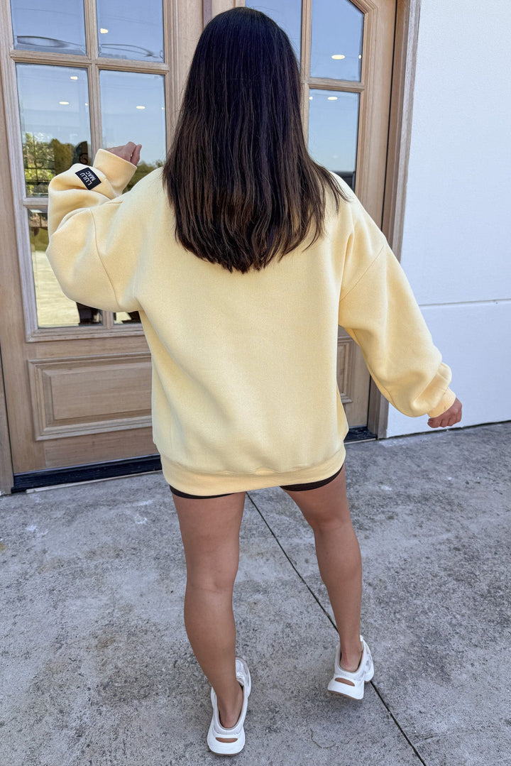 solid butter yellow combo embroidered lulu mac long sleeve sweatshirt with banded bottom hem