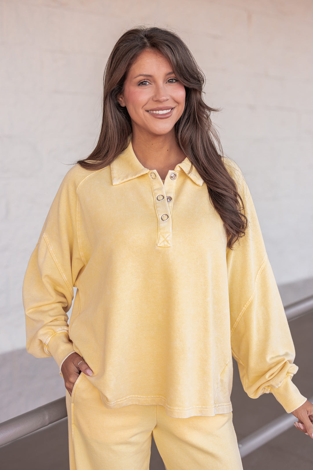 butter yellow button neckline pullover top
