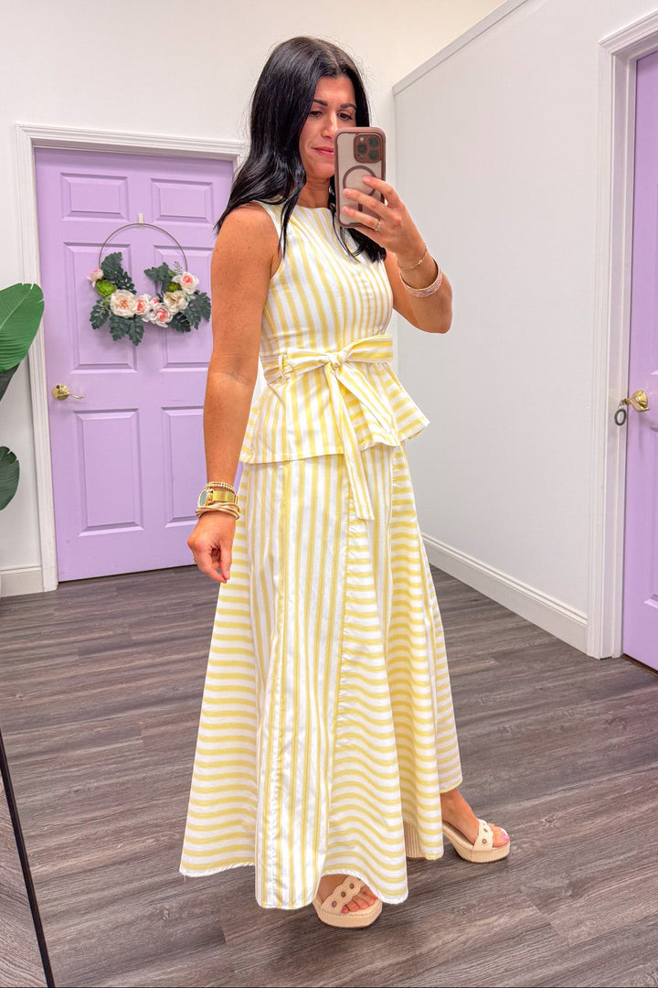 trending butter yellow white striped maxi skirt outfit