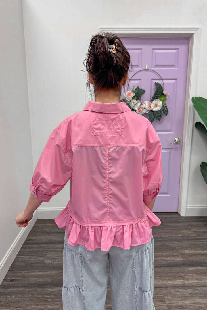 Women's semi-cropped pink peplum top by Entro with short puff sleeves