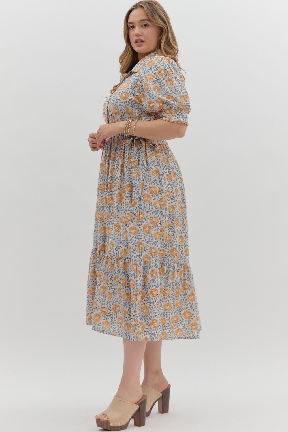 Women's cream midi dress with caramel and blue floral print by Entro in Plus showing side view