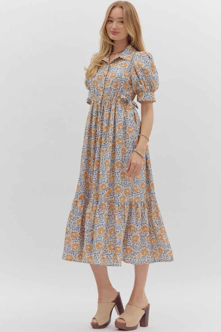 Women's cream button front midi dress with caramel and blue floral print by Entro showing skirts relaxed silouhette