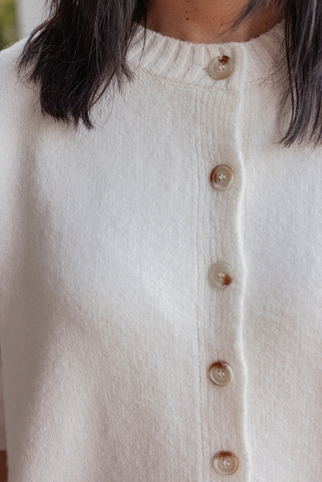 Women's off white brushed knit button front top by Wishlist showing up close front view