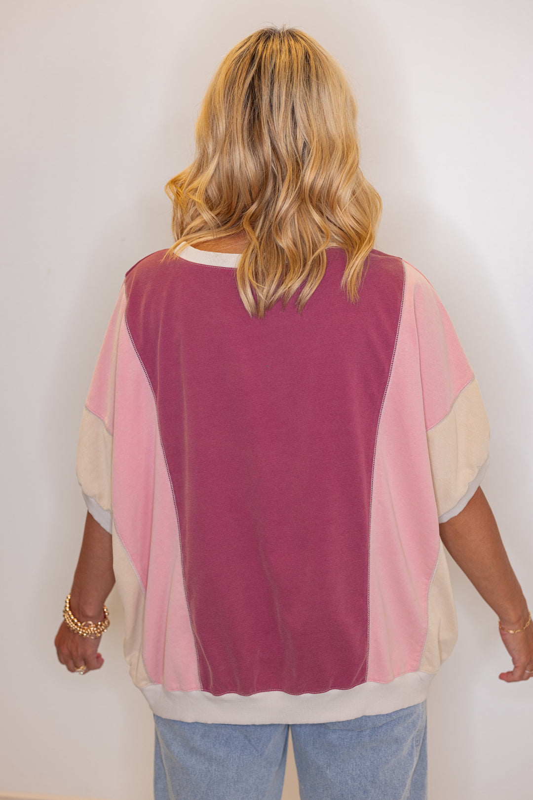 Women's washed french terry knit colorblock top in burgundy and coral by Easel showing back view