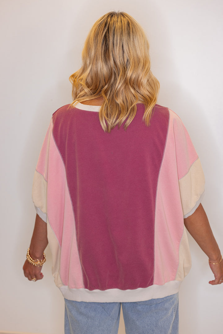 Women's washed french terry knit colorblock top in burgundy and coral by Easel showing back view