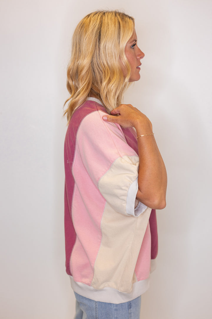 Women's washed french terry knit colorblock top in burgundy and coral by Easel showing side view