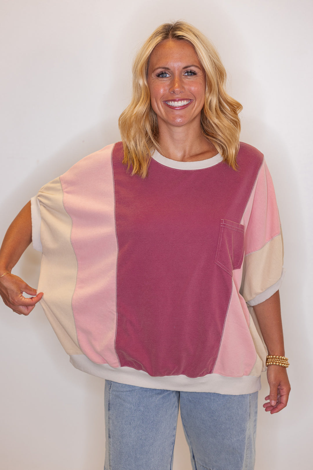 Women's washed french terry knit colorblock top in burgundy and coral by Easel showing relaxed fit