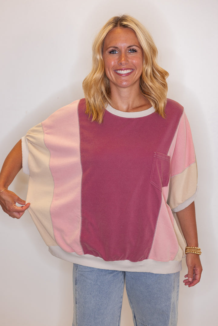Women's washed french terry knit colorblock top in burgundy and coral by Easel showing relaxed fit