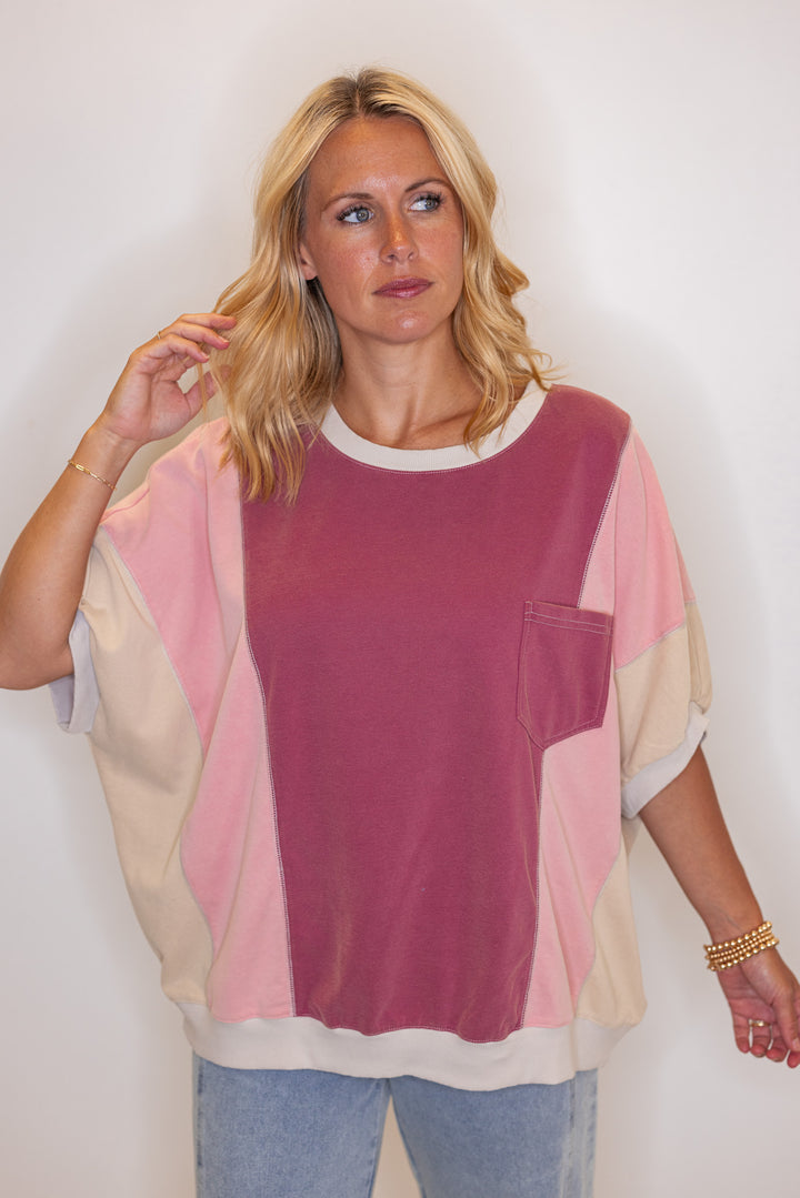 Women's washed french terry knit colorblock top in burgundy and coral by Easel showing up close front view