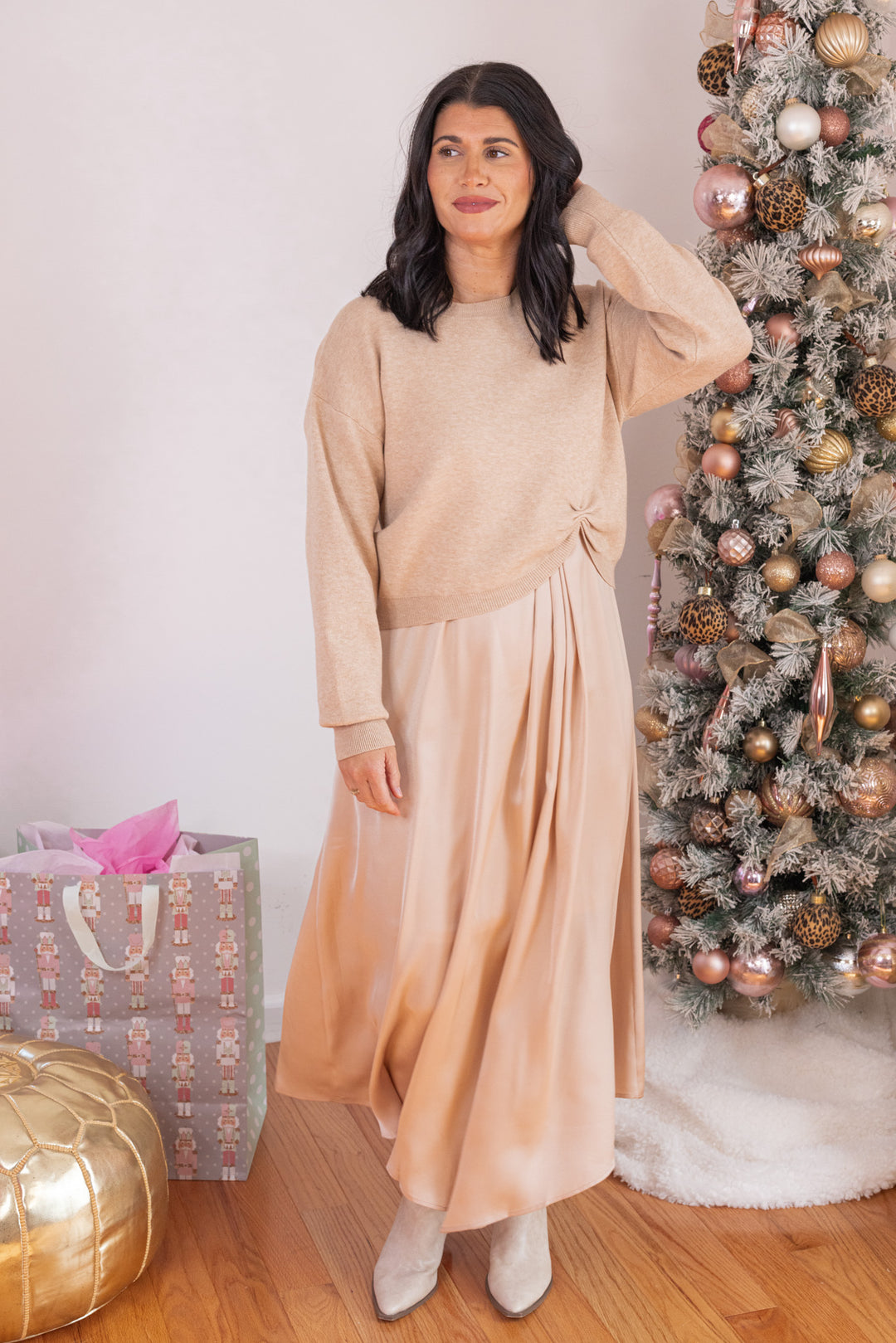 Women's champagne satin mixed fabric midi dress with asymmetrical hem by Jodifl shown with sweater