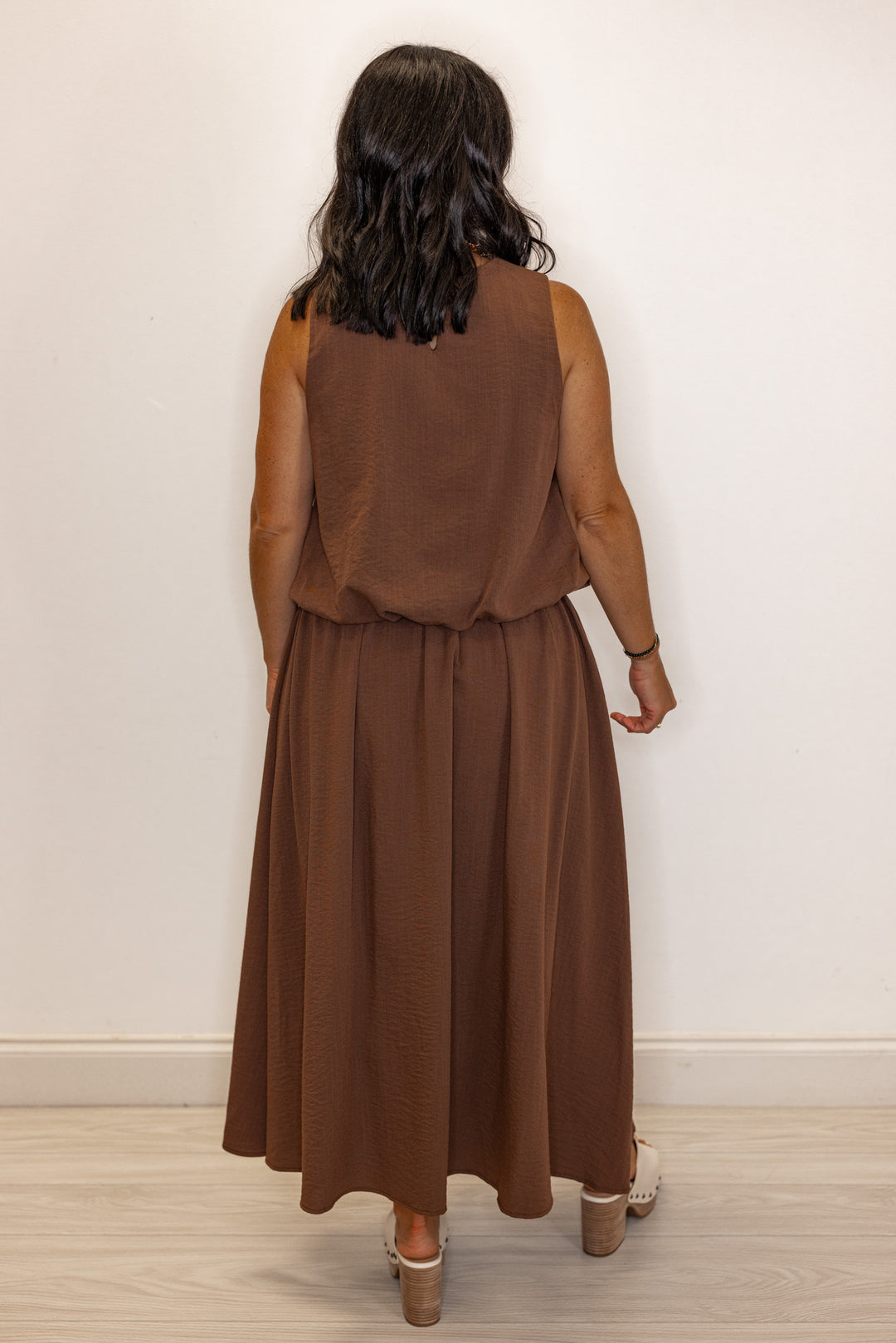 Women's espresso brown textured midi skirt with pleats by Entro showing full back view