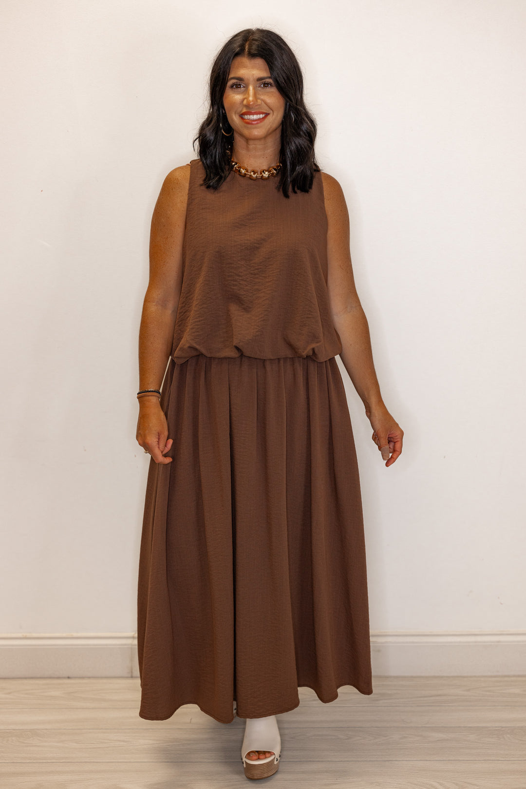 Espresso brown textured bubble hem sleeveless crop top by Entro showing full front view
