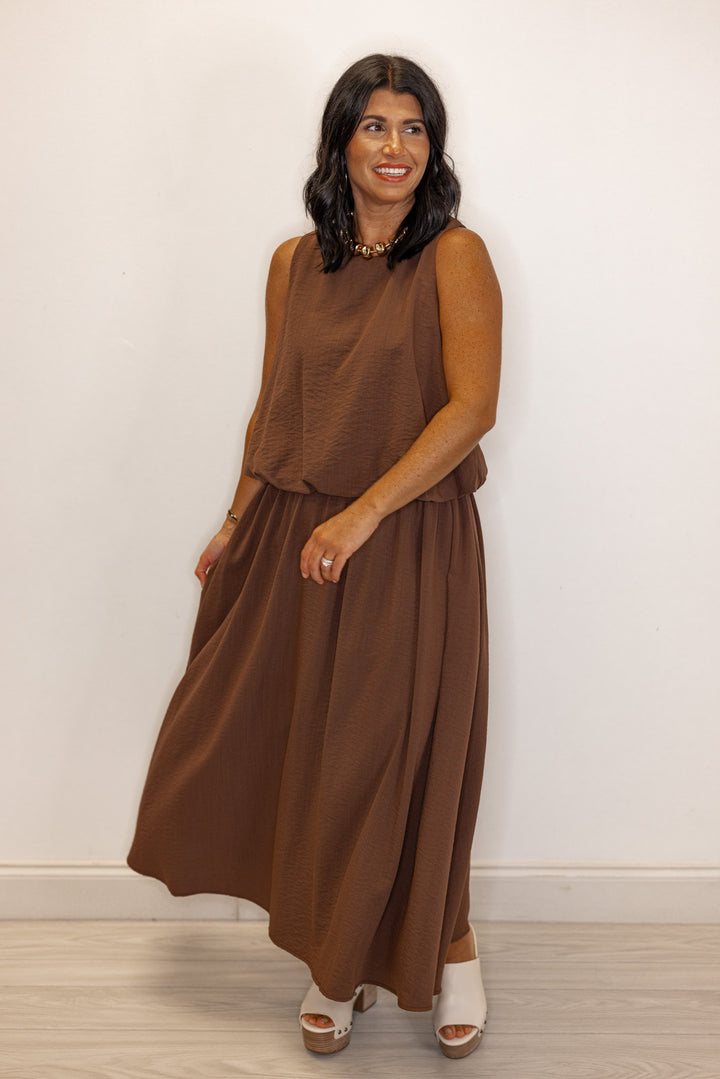 Women's espresso brown textured midi skirt with pleats by Entro showing flowy skirt