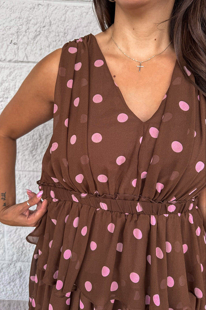 dark brown tiered midi dress with pale pink polka dots