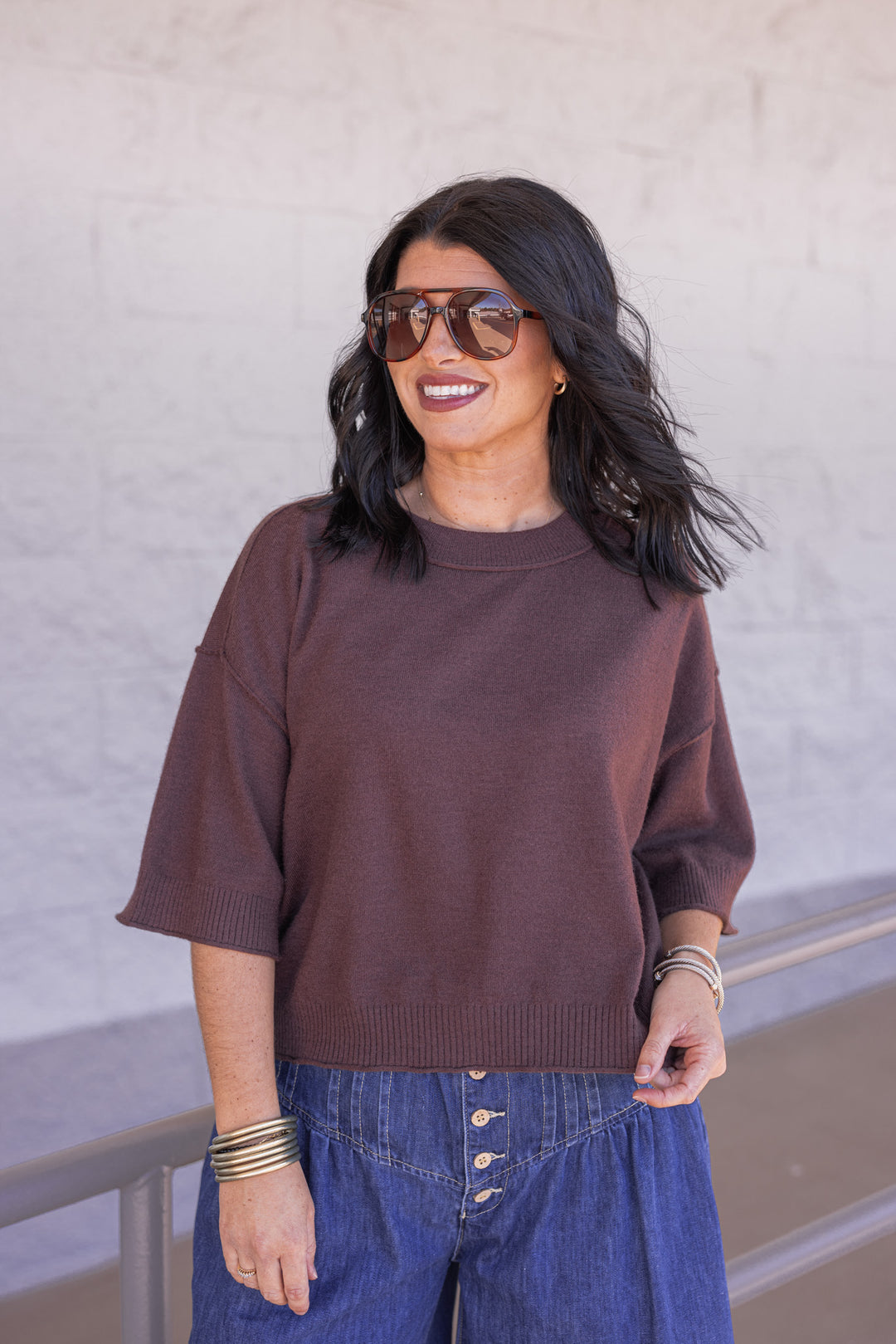Women's brown knit top with reverse seam details by Entro
