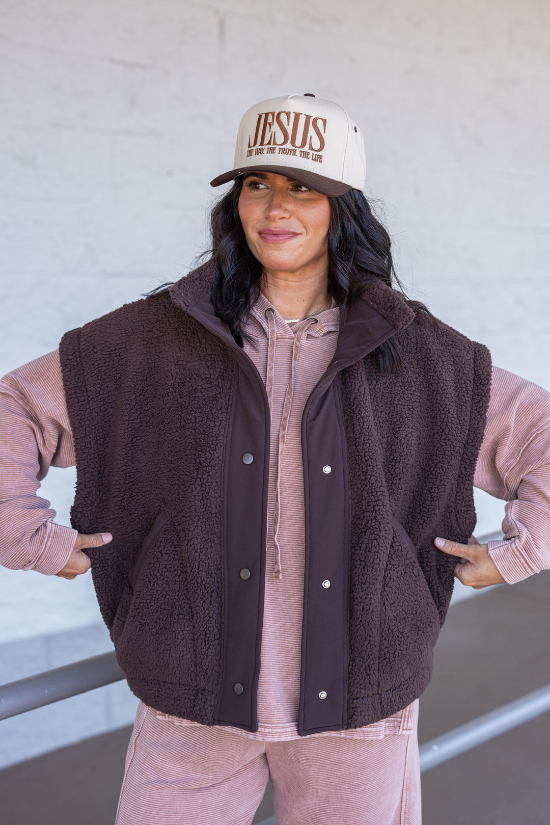 Women's espresso brown sherpa vest by Rae Mode showing relaxed fit