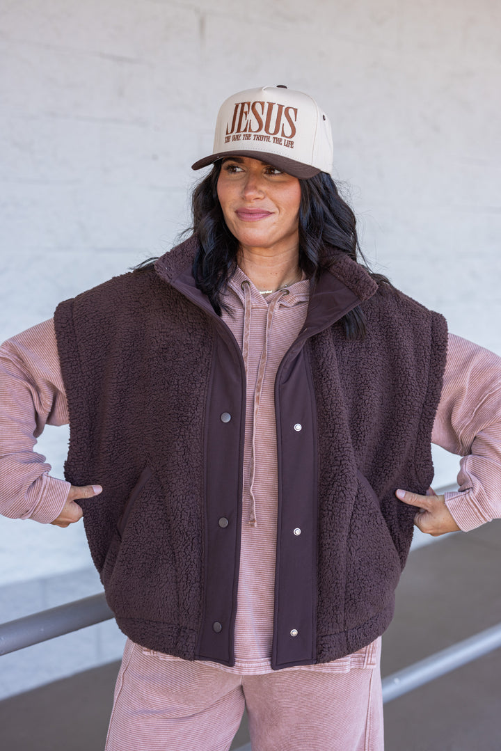 Women's espresso brown sherpa vest by Rae Mode showing relaxed fit