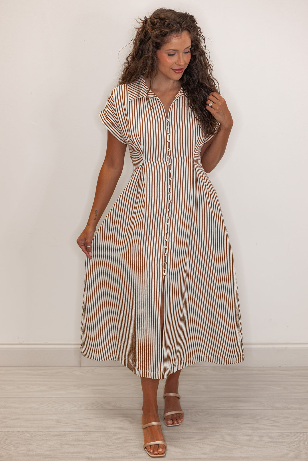 Women's short sleeve ivory and brown striped midi dress with front buttons