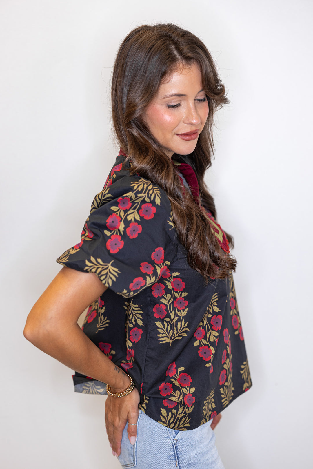 Women's black and burgundy floral poplin top by Entro showing up close side view