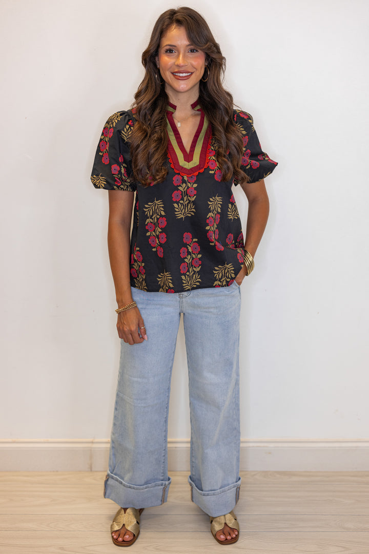 Women's black and burgundy floral poplin top with caftan inspired banded v neckline by Entro showing full front view