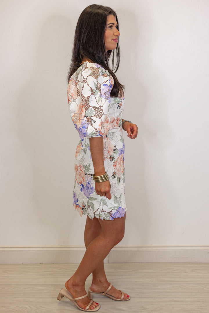 white eyelet embroidered floral mini dress