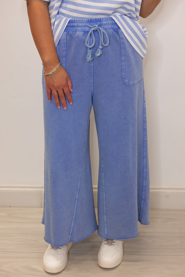 Women's mineral washed cornflower blue french terry knit wide leg cropped pants by Easel showing up close front view