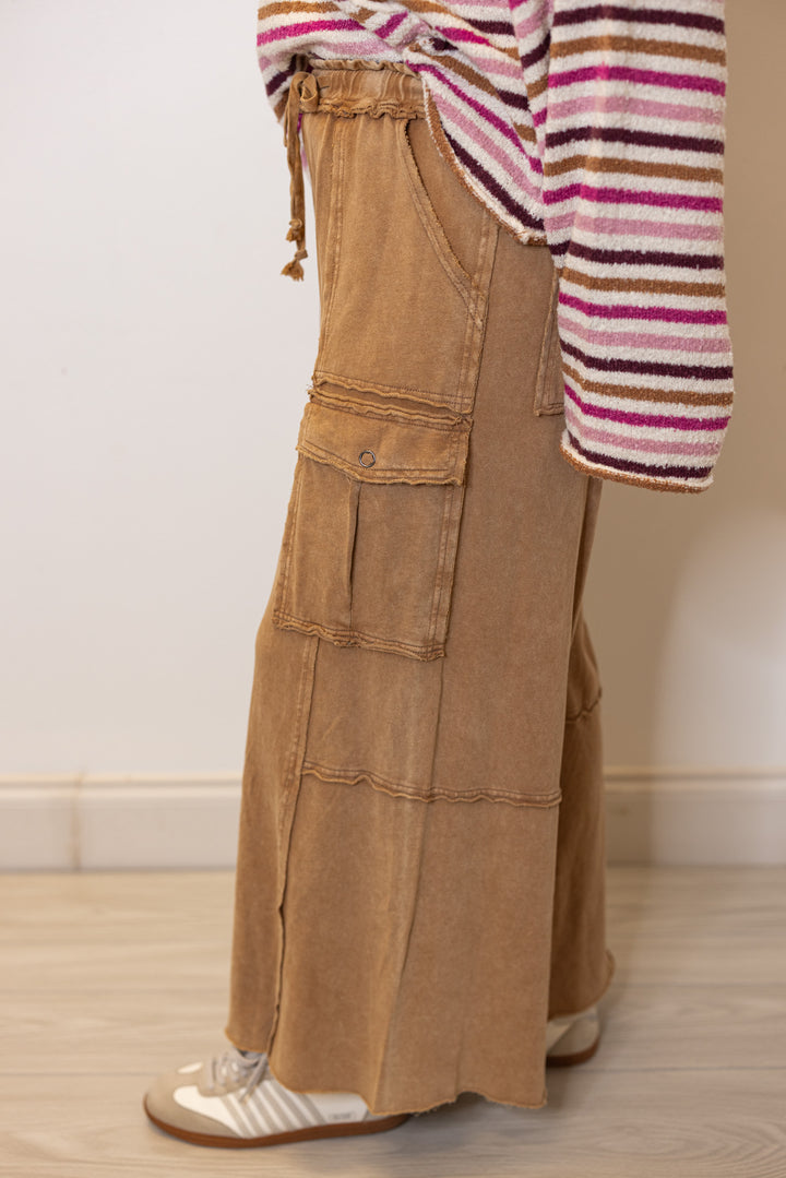 Mineral washed faded latte brown terry knit cargo pants by Easel showing up close side view