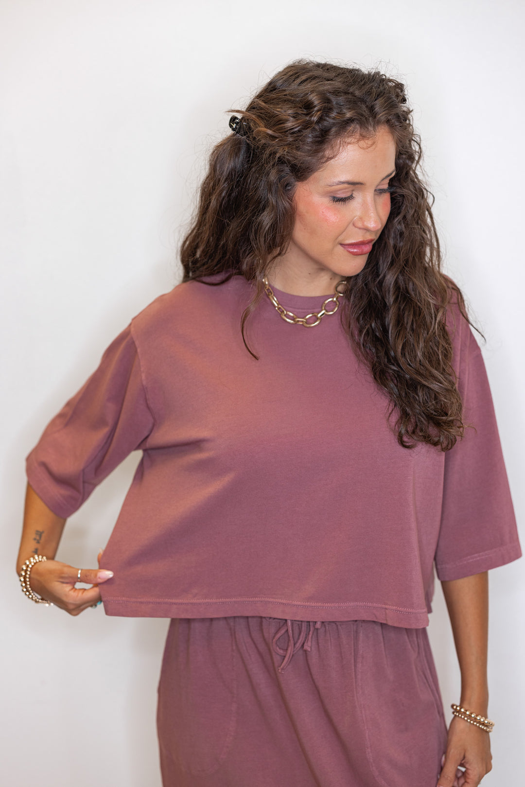 Close up of Women's dusty rose knit crop top