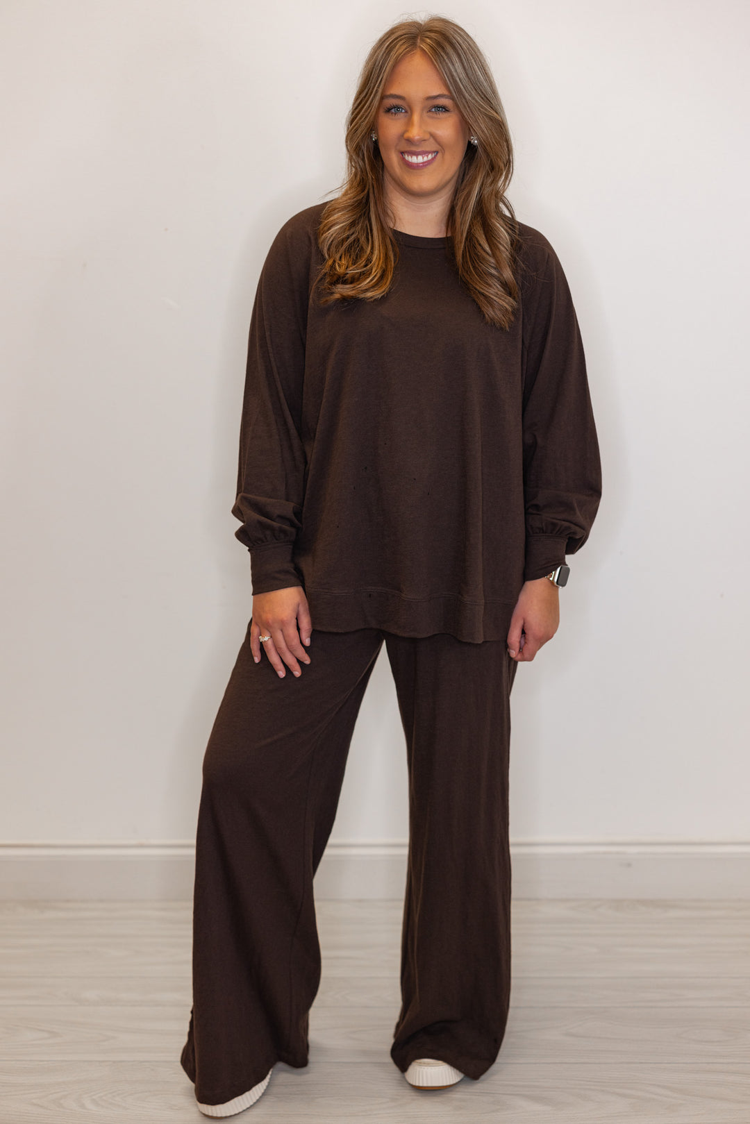 Women's brown active pants with matching crew neck top