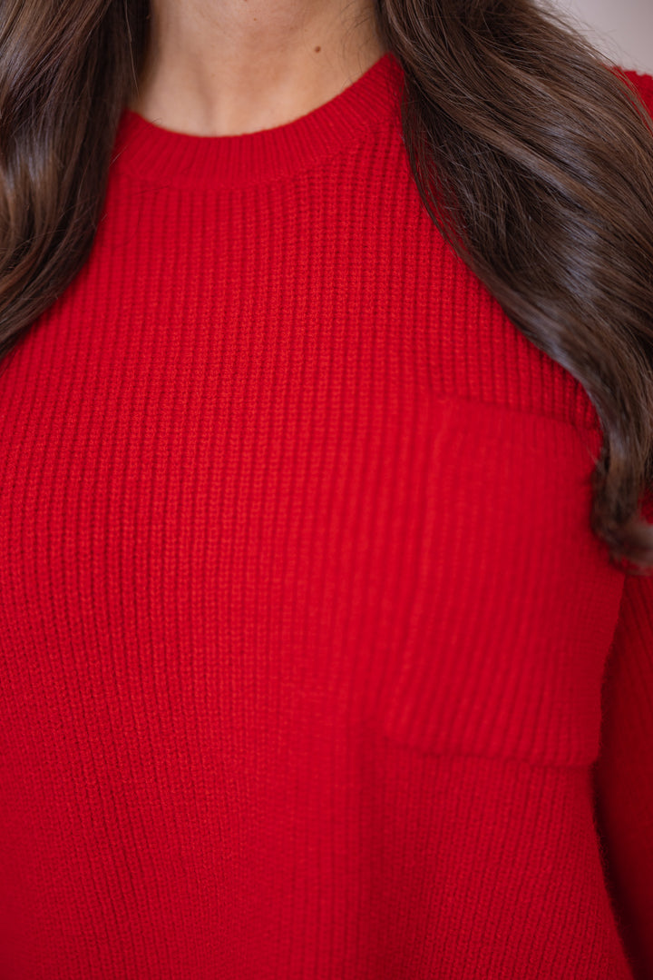Women's red ribbed knit sweater with oversized long sleeves by Wishlist showing bodice view