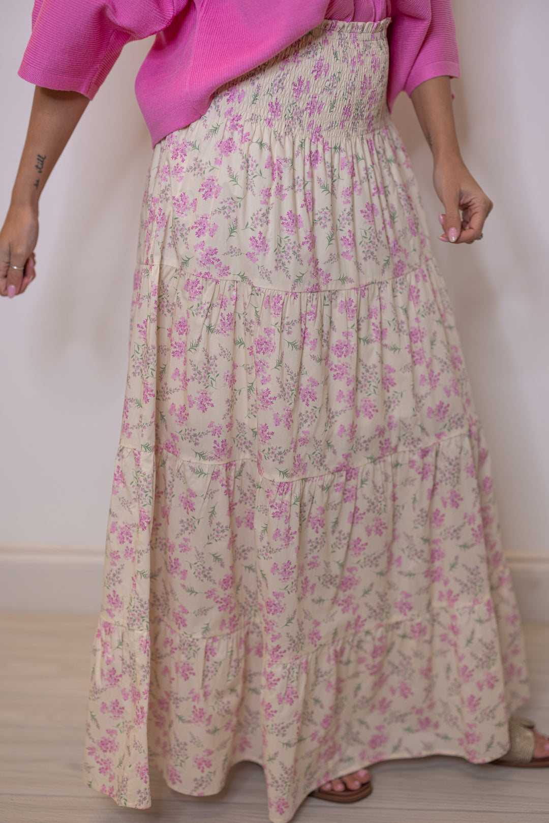 Women's cream maxi skirt with pink floral print by Wishlist showing tiered details