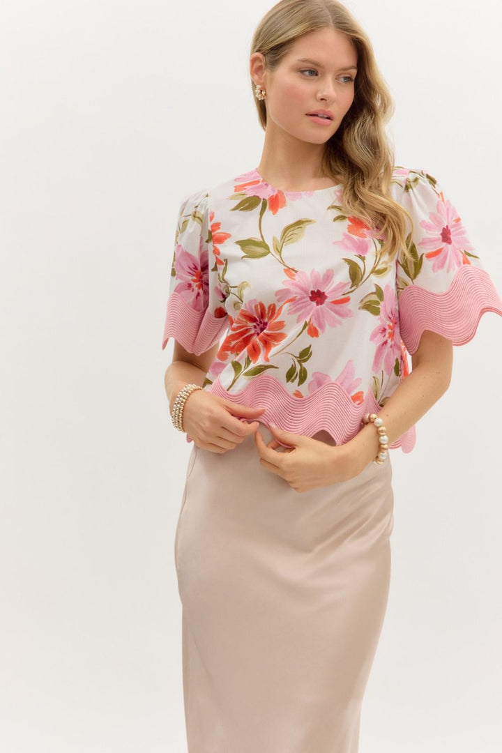 Women's cream and pink floral top with scalloped trim by Entro