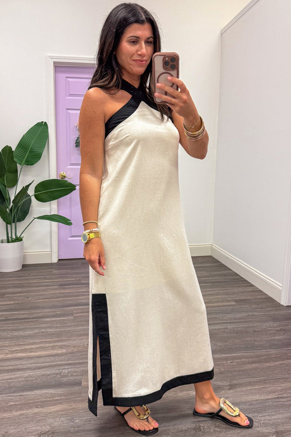cream with black trim bottom hem side slits sleeveless halter midi dress