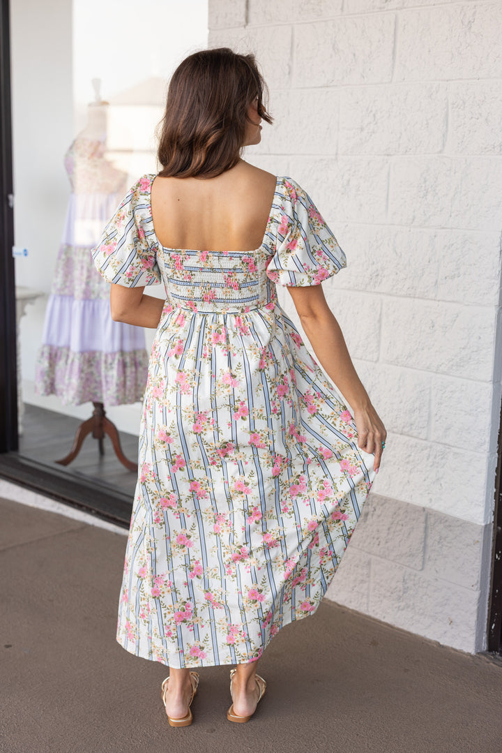 cream smocked back poplin midi dress with stripes and floral print