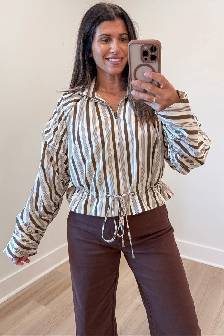 cream and brown striped long sleeve zipper front semi-cropped jacket top with stand-up high neckline