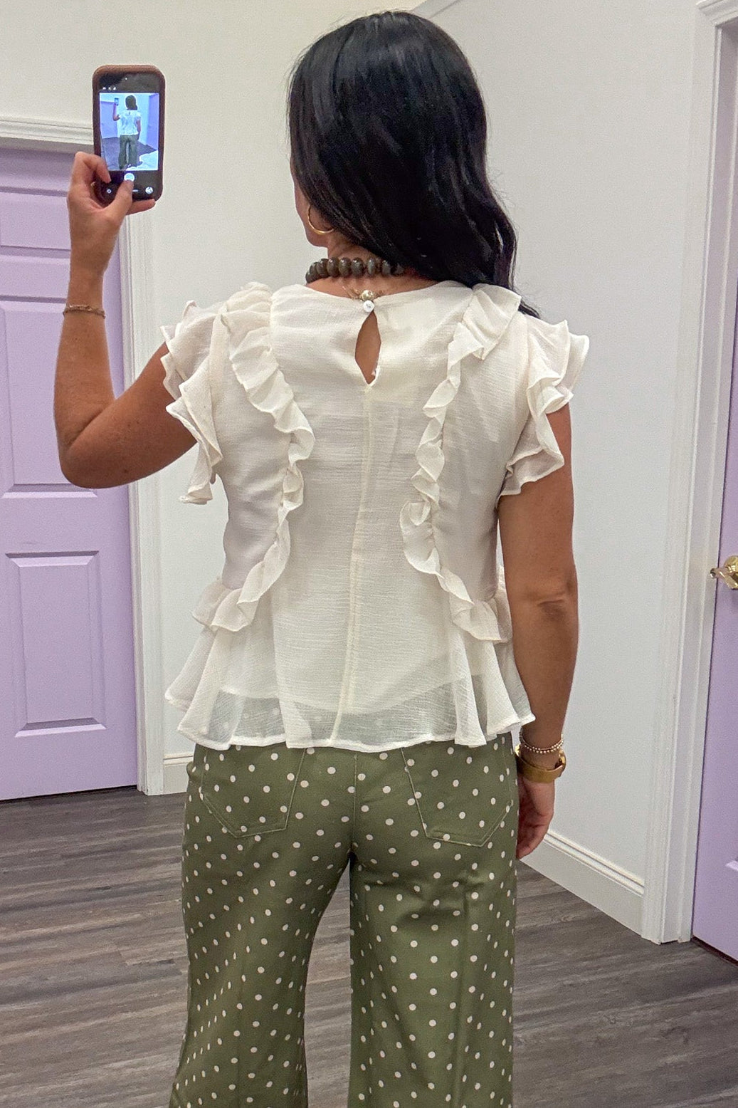 solid cream cap sleeve semi-cropped chiffon top with ruffle details and keyhole button closure