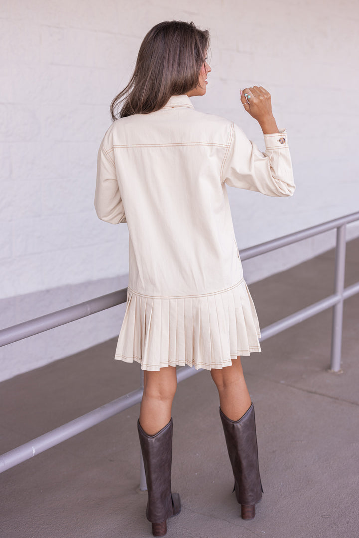 Women's ecru denim twill button front dress with brown stitching trim by Entro showing full back view