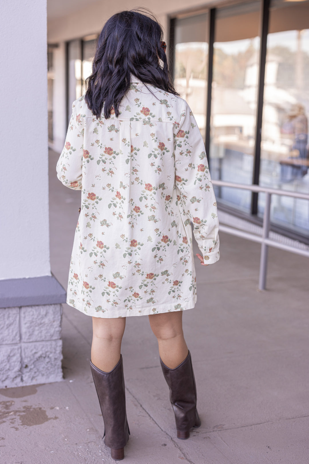 Women's cream denim floral print dress with button front bodice by In February showing button details showing full back view