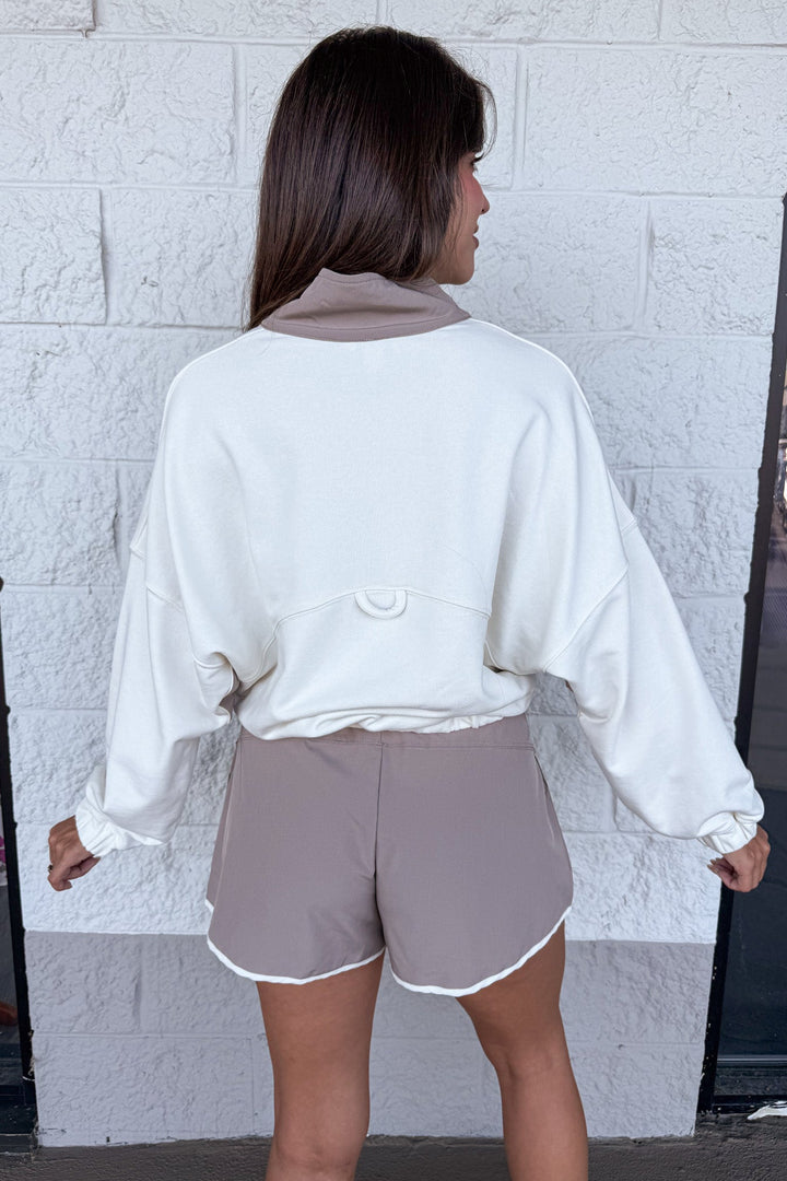 cream with mocha colorblock details collared snap bodice long sleeve pullover