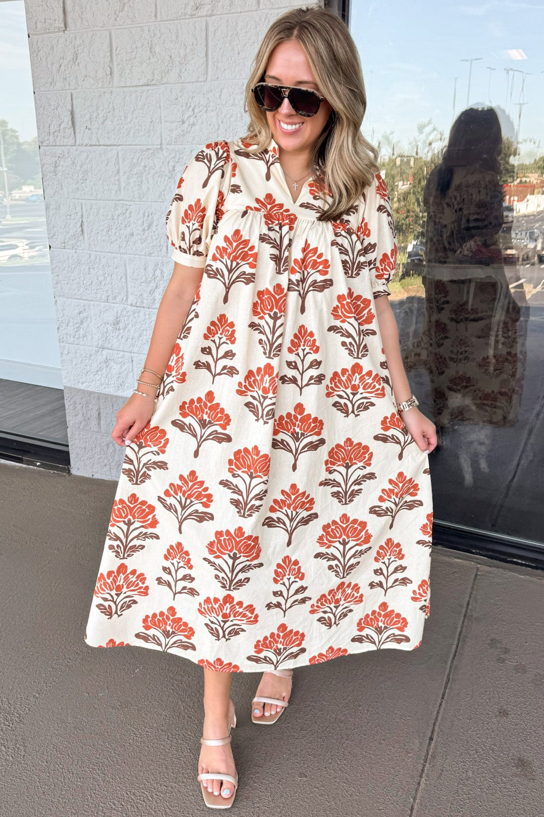 cream with orange and brown floral print puff sleeve flowy poplin midi dress