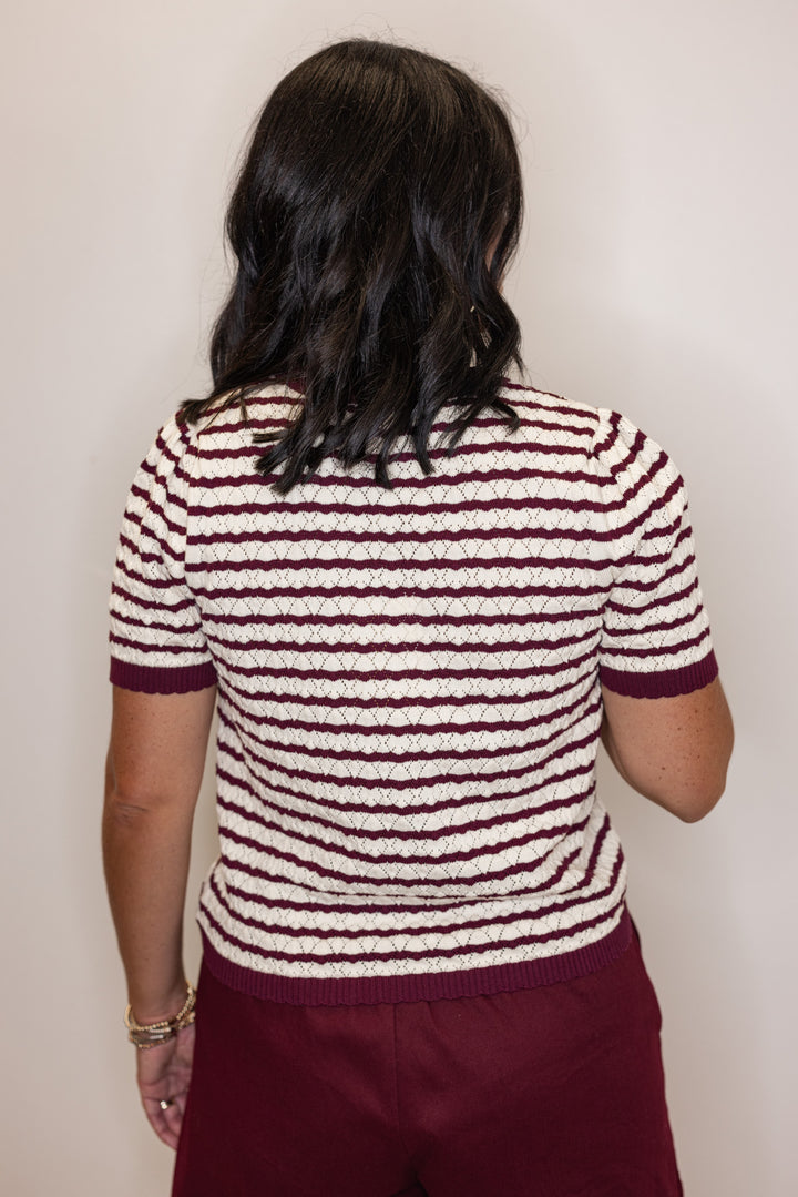 Women's burgundy and cream striped knit top with scalloped trim by Entro showing up close back view
