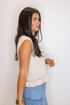 beige sleeveless knit top