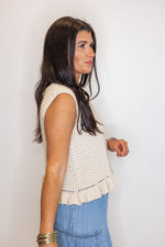beige sleeveless knit top
